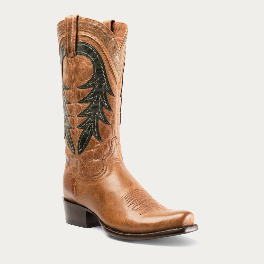 A brown leather cowboy boot with a decorative stitch pattern and black leather details